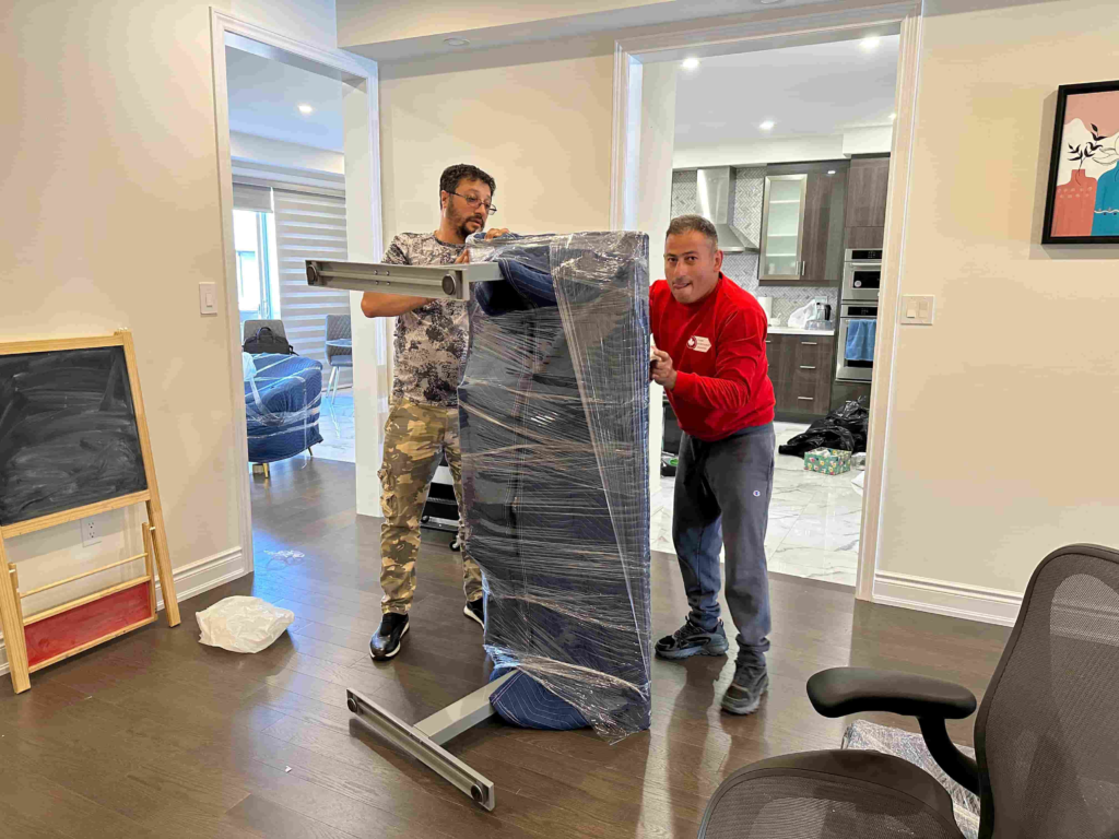 Student smiling during a stress-free move with our crew University Moving Services in Canada