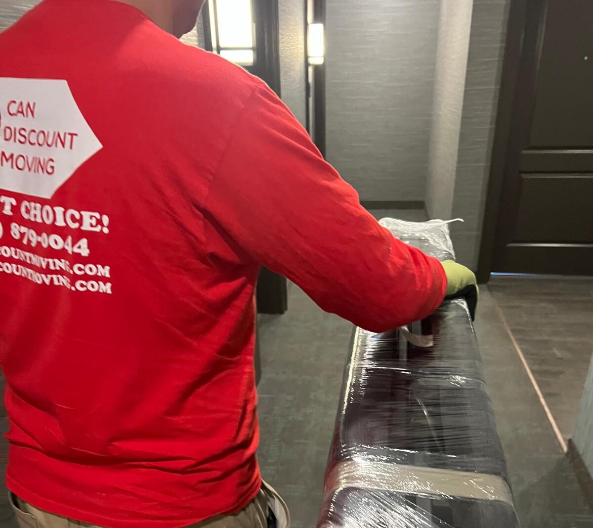 Professional movers loading furniture for a residential relocation in Canada
